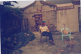 an old Taiwanese gentleman plays the two-stringed viola in a village of the Seven-Beauties 
			Island